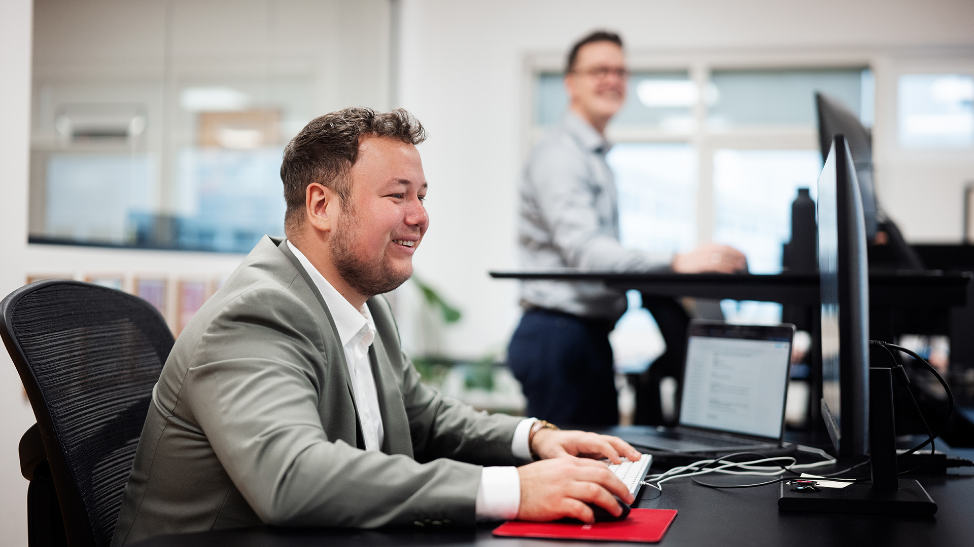 colleagues at Enetpulse working in the office