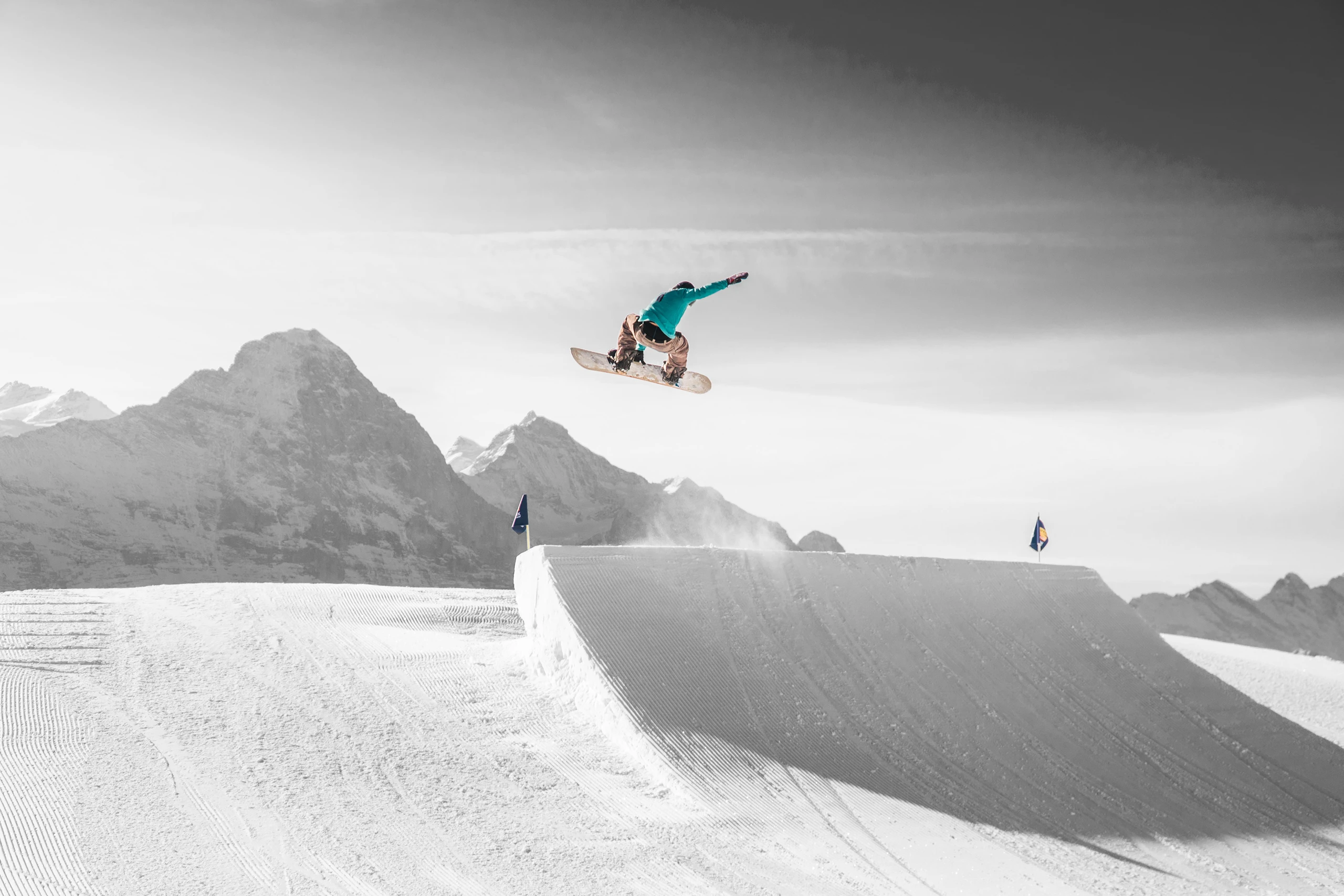 Winter Olympics snowboarder jumping
