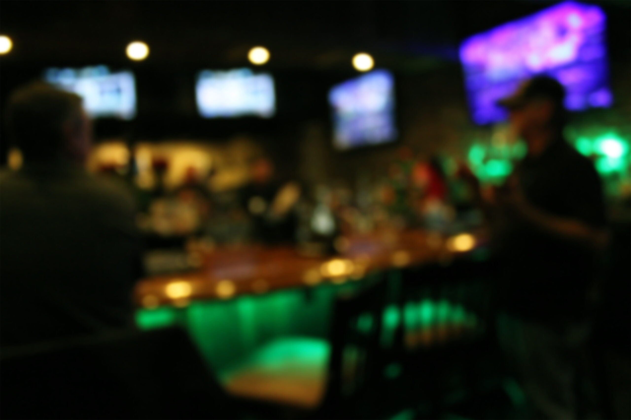 a blurred sports bar