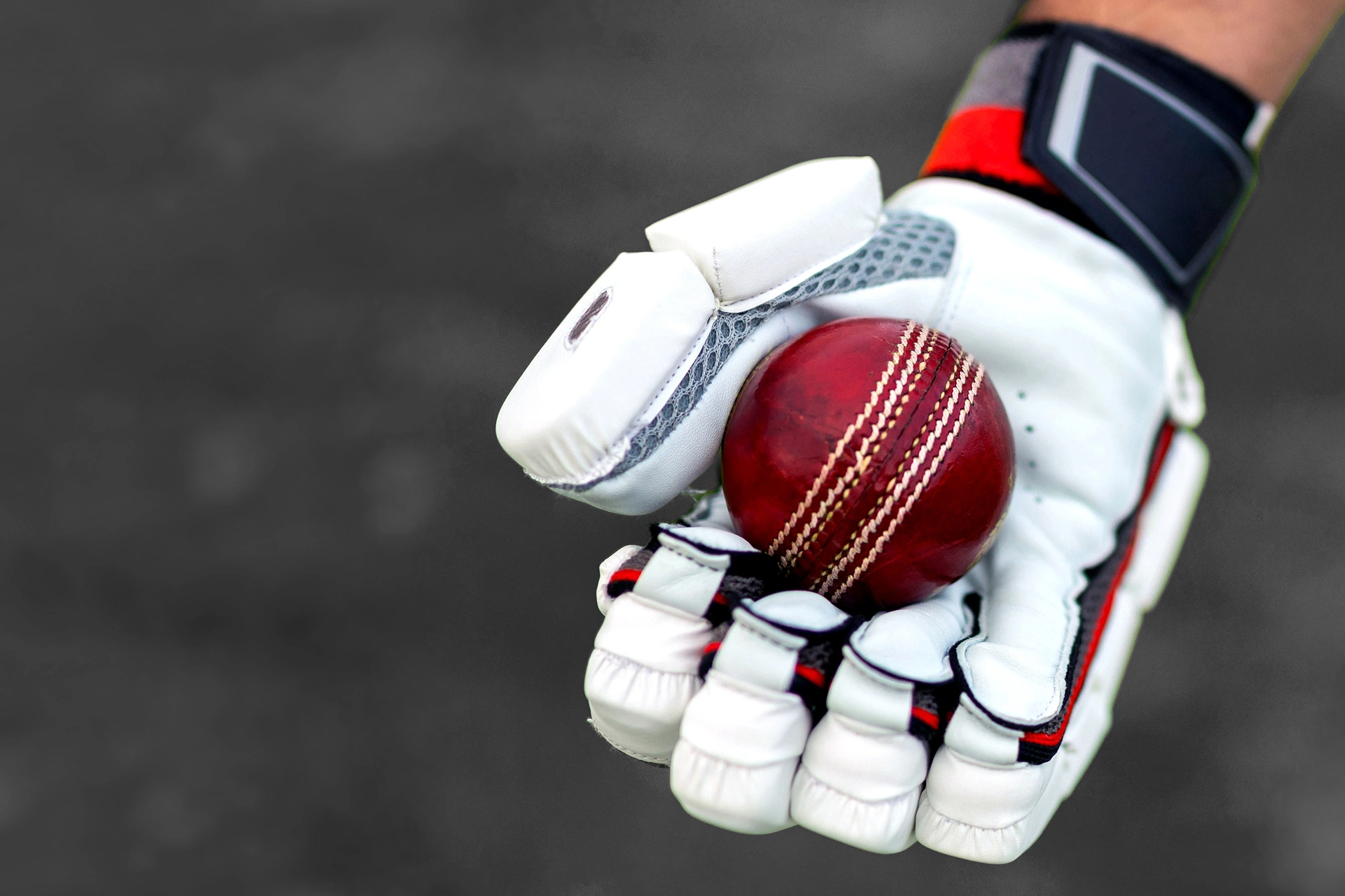 Cricket ball in catchers glove