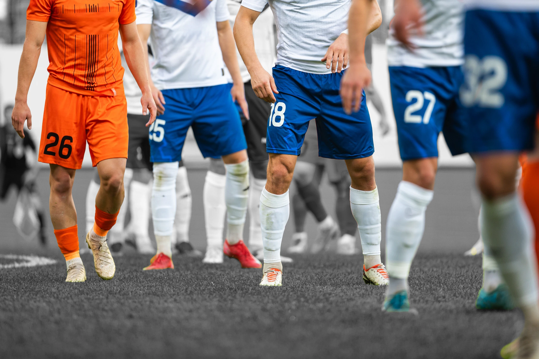 Football players waiting for a corner kick