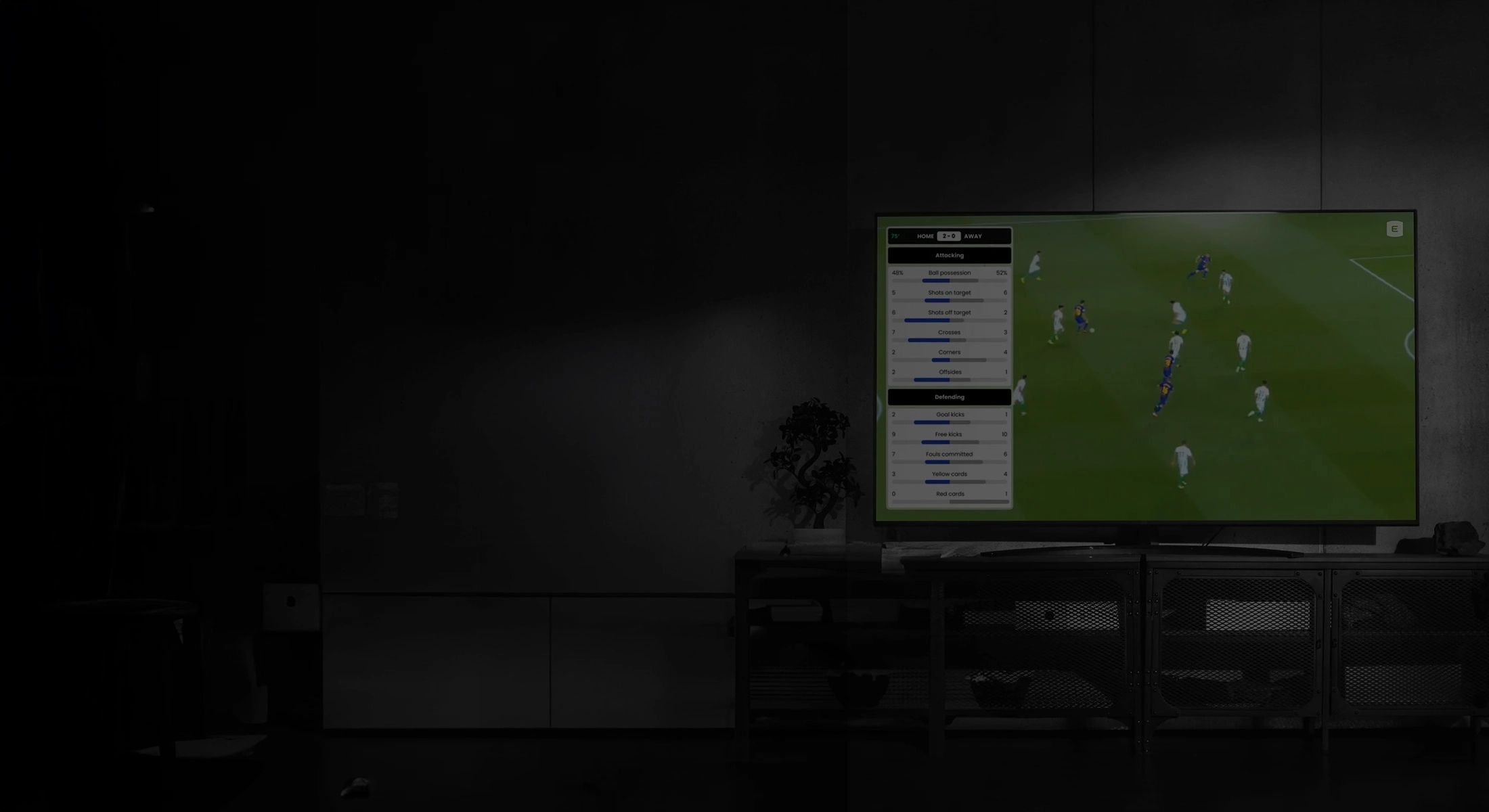 a TV displaying a football match with game statistics and data.