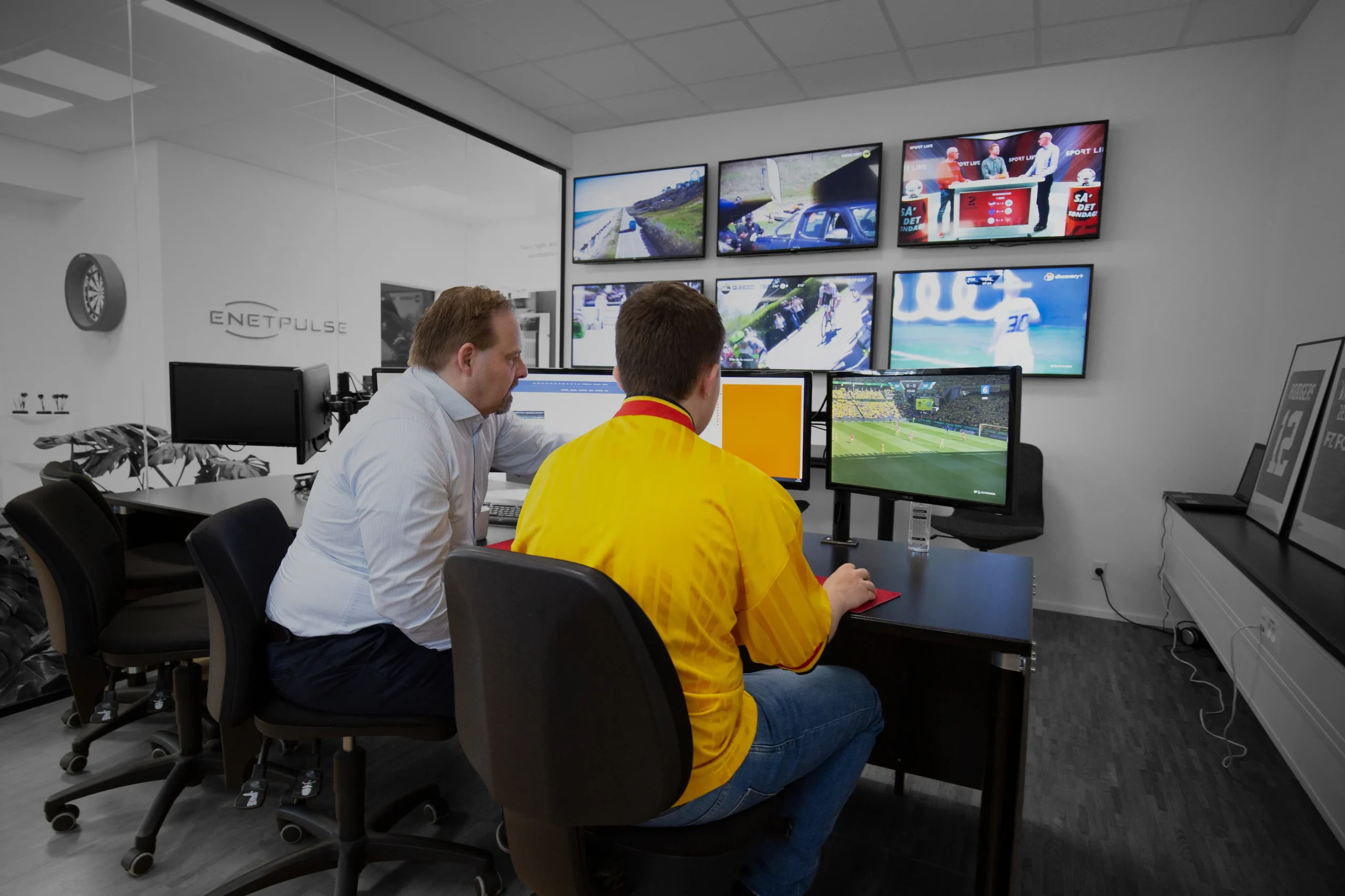 Two updaters monitoring games and events